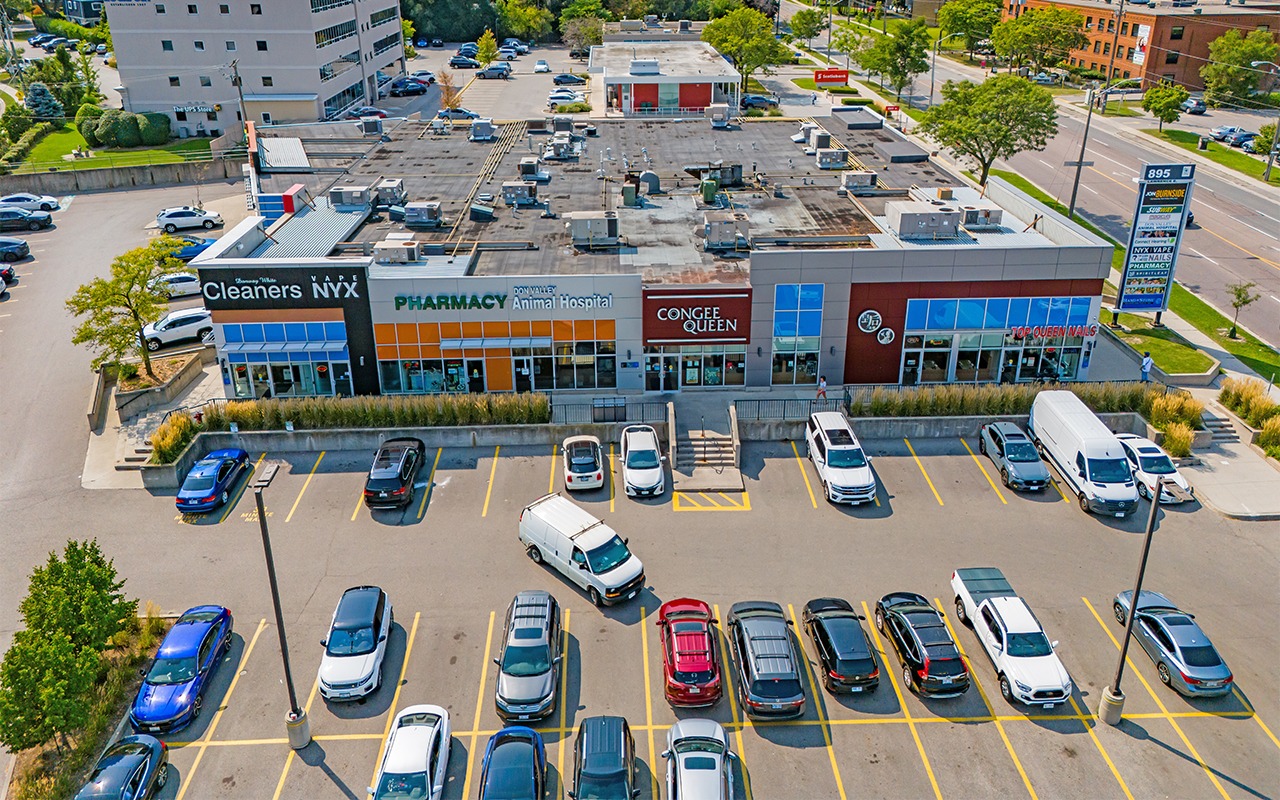 895 Lawrence Avenue E Aerial View with Storefronts and Parking